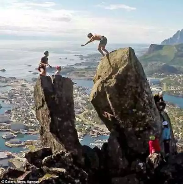 DANGEROUS STUNT!! 18-Year-Old Daredevil Risks His Life To Perform This Daring Stunt (Photos)